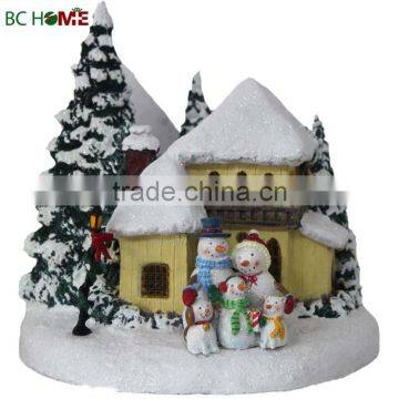 Christmas House with Christmas tree and snow man Decoration