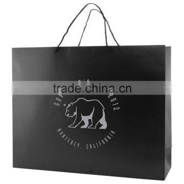 Black Matte Laminated Eurotote Shopping Bag - features cardboard bottom and dimensions are 20" x 6" x 16", comes with your logo.