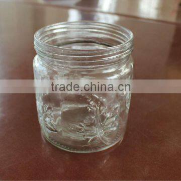 Glass jar with drawing