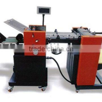 Paper folding machine