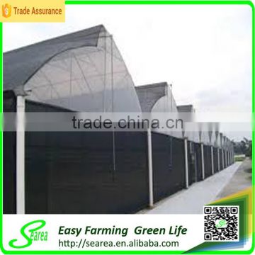 Agricultural solar greenhouse with shading net