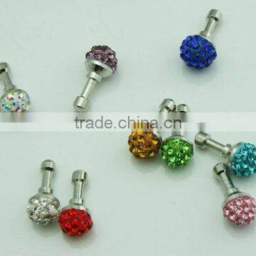 Cell phone dust jack plug with diamonds