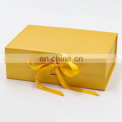 Golden art paper folding flip top cardboard gift box packaging idea with magnetic lid