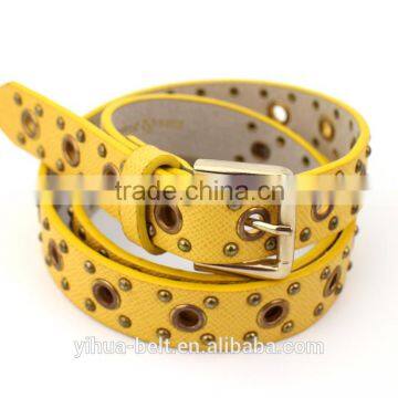 Fashion belt with gold eyelets and rivet for woman