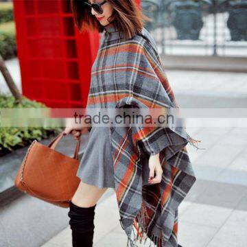 15BCP6008 Cape poncho with tassels