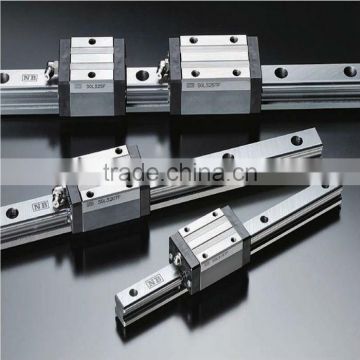 Linear slide bearing with linear bearing block