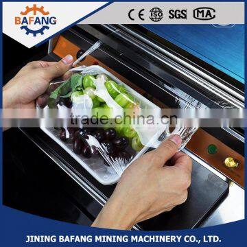 Efficient pvc cling film packing machine food tray film sealing machine