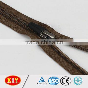 high quality brown tape black rubber pull close end nylon zipper