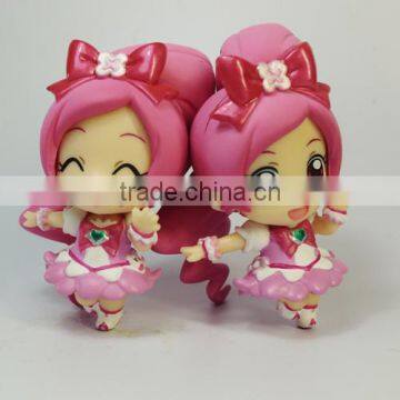 Small cartoon girl figurine