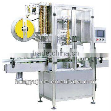 Automatic sleeve labeling machine