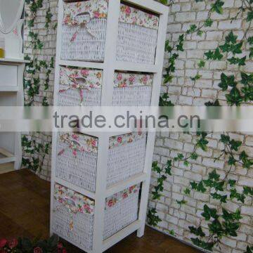 white wooden cabinet with 4 wicker drawers