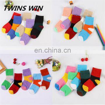 China supplier ODM Custom logo color anti-slip unsex cartoon child winter fashion knitted tube cotton sock