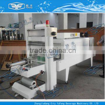 Semi - automatic shrink wrapping machine / bottle shrink wrapping machine