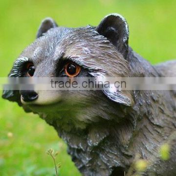 Resin raccoon garden statue