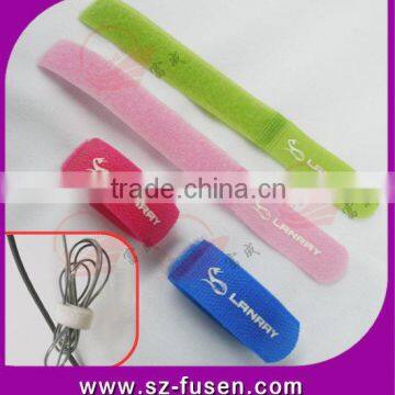 Durable hook and loop cable strap/self-locking cable tie