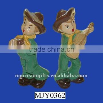 Decorative resin cowboys and instruments plaster figure