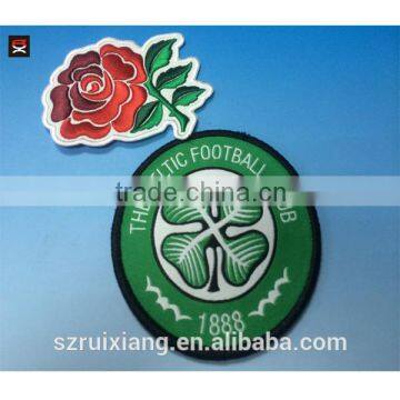 Adhesive pellon backing embroidered border woven patch