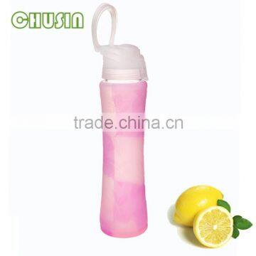 portable sports glass water bottle with BPA free PP lid and silicone sleeve