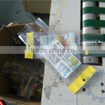 Trilateral sealing bag making machine