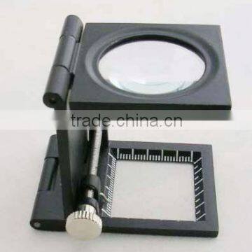 9005C folding magnifying glass with zinc alloy black frame ,8x optical glass, with calibration and finger