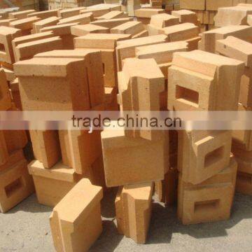 Shaped refractory fireclay bricks for low temperature areas of furnace