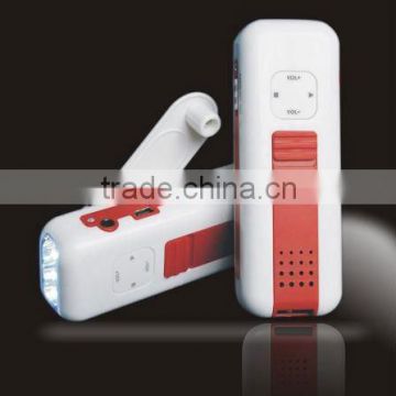 Crank dynamo torch with FM radio