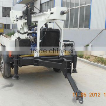 trailer-mounted water well drilling rig