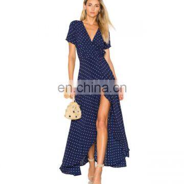 Wrap around front with tie closure Shirred detail lily wrap maxi dress classic polka dot