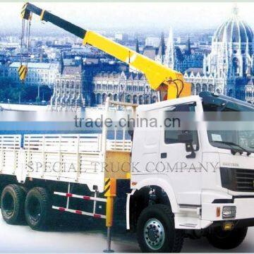 HOWO Mounted crane loading 30TCargo truck with crane