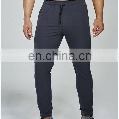 Quick Dry Elastic Drawstring Waist Sports Gym Pants With Zip Side Pocket Reflective Stripe Men's Workout Training Jogging Wear photo-5