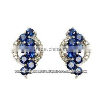 sapphire earring design with diamond roundals at back