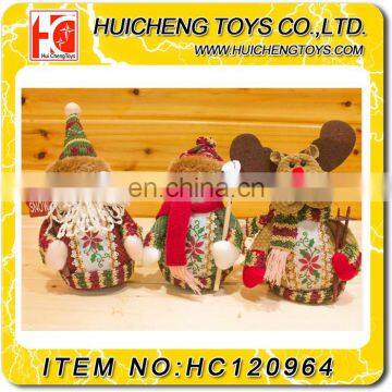 8-inch Santa Claus, snowmen, deer decorate the table