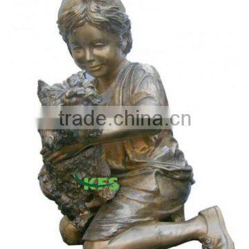 Bronze kid statue with little puppy