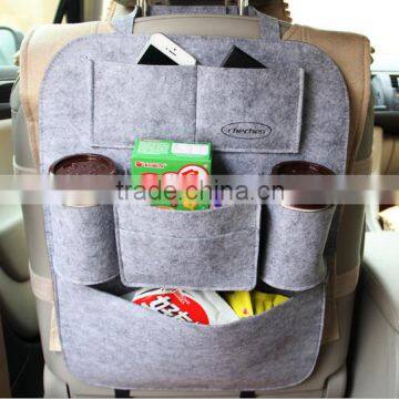 Automobile seat back finishing storage bag