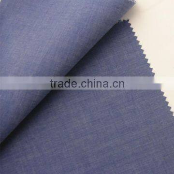 rolls of indigo denim jeans fabric