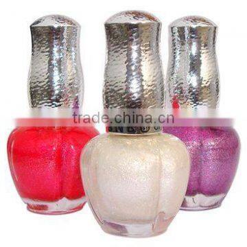 Small empty nail polish bottles with brush