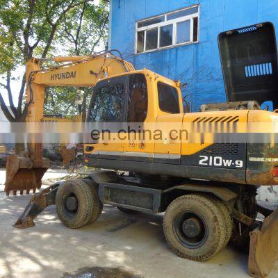 Cheap used South Korea Hyundai 210 w-9 wheel excavator 21 ton wheel digger  on sale in Shanghai