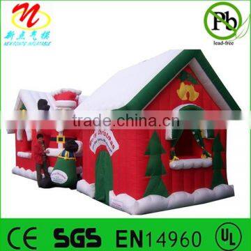 Inflatable Christmas house with animated Santa