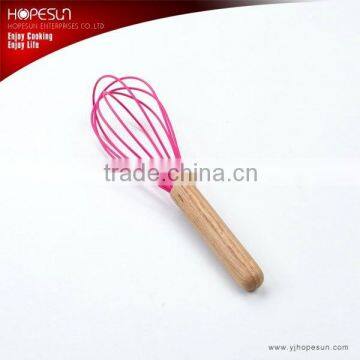 Silicone egg beater with wooden handle