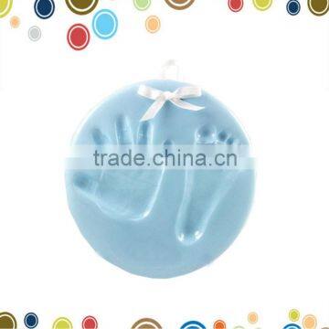 Blue baby handprint and footprint ornament