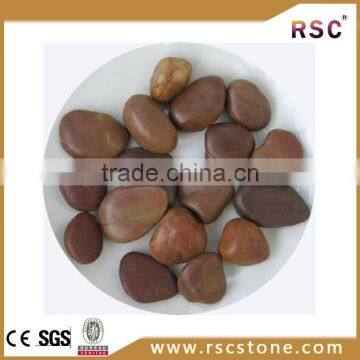 Red glow in the dark pebble stone