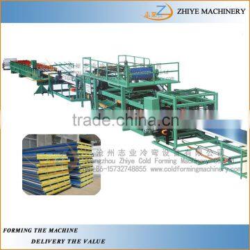 Colored Steel Sandwich Panel Machine/Manufacturing Automatic Sandwich Steel Roof Panel Forming Machine photo-4