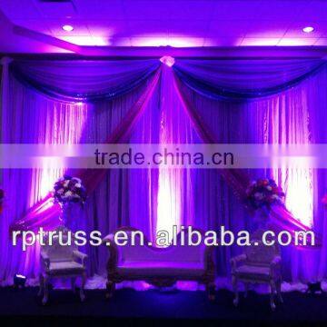 Purple mystery wedding pipe and drape telescopic crossbar