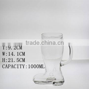 clear glass boot-shaped beer glass with handle