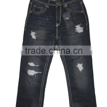 Washing men's jeans pants with hole