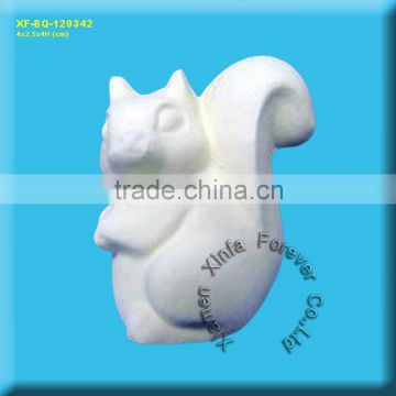 unpainted ceramic squirrel figurine