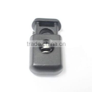 Plastic adjustable toggle for coat