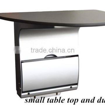 Stainless steel table near the boards and litter bins of High-speed train/railway/subway