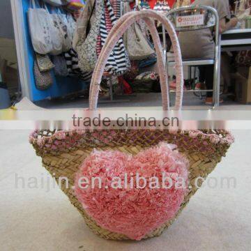 natural seagrass handmade bag with flower decoration