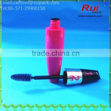 Red mascara tube with double layer brush cap